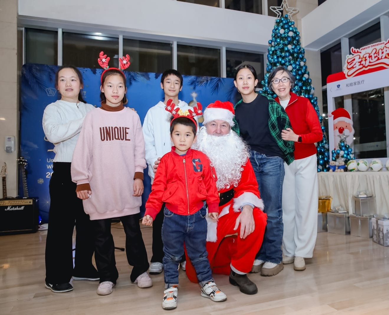 Children and volunteers celebrating Christmas