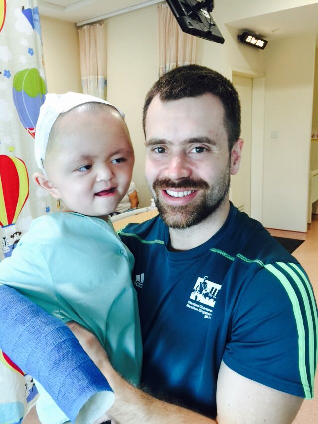 A child with a supporter